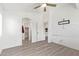 Bright bedroom with fan and stylish accent wall at 2402 E 5Th St # 1457, Tempe, AZ 85288