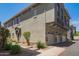 Wide angle view showing exterior features garages, walkway and entryways of building 1457 at 2402 E 5Th St # 1457, Tempe, AZ 85288
