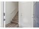 Interior view showing entry staircase, coat closet and entry door of home at 2402 E 5Th St # 1457, Tempe, AZ 85288