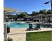 Relaxing community pool area with comfortable lounge chairs, shaded seating, and a tranquil atmosphere for residents to enjoy at 2402 E 5Th St # 1457, Tempe, AZ 85288