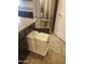Under-counter pull-out trash bins provide convenient kitchen waste disposal at 25945 W Runion Dr, Buckeye, AZ 85396