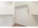 Walk-in closet with carpet and shelving at 25945 W Runion Dr, Buckeye, AZ 85396