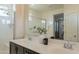 Bathroom featuring dual sinks, a frameless shower and a large mirror at 2680 E Daniel Dr, Gilbert, AZ 85298