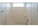 Bright and clean shower area with white tile surround and chrome fixtures at 2680 E Daniel Dr, Gilbert, AZ 85298