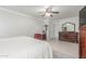Bright bedroom featuring neutral walls, tile floor, and decorative furnishings at 2896 W Hayden Peak Dr, San Tan Valley, AZ 85144