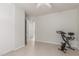 Bright bedroom featuring neutral walls, tile floor, and ceiling fan at 2896 W Hayden Peak Dr, San Tan Valley, AZ 85144