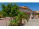 Charming single-story home featuring a two-car garage, low maintenance landscaping, and a terracotta tile roof at 2896 W Hayden Peak Dr, San Tan Valley, AZ 85144
