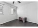 Cozy bedroom featuring dark tile flooring, and natural light at 2941 N 19Th Ave # 95, Phoenix, AZ 85015