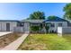 Exterior view of a single-story home, showcasing the well-maintained lawn and landscaping at 2941 N 19Th Ave # 95, Phoenix, AZ 85015