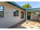 Home exterior featuring a covered patio and well-maintained brick at 2941 N 19Th Ave # 95, Phoenix, AZ 85015