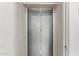 Narrow hallway with folding closet doors at the end at 2941 N 19Th Ave # 95, Phoenix, AZ 85015