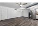 Spacious living room with modern flooring, neutral paint, and updated fixtures at 2941 N 19Th Ave # 95, Phoenix, AZ 85015