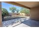 Covered patio overlooking a well-maintained, landscaped backyard at 3351 W Via Del Sol Dr, Phoenix, AZ 85027