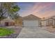 Charming single-story home with a well-maintained front yard and a two-car garage at 3351 W Via Del Sol Dr, Phoenix, AZ 85027