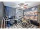 Music room with decorative wall hangings, ceiling fan, and recording equipment at 3351 W Via Del Sol Dr, Phoenix, AZ 85027