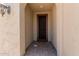 Inviting entryway with decorative sconce lighting and textured walls at 34009 N 29Th Dr, Phoenix, AZ 85085
