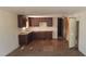 Open-concept kitchen area with ample cabinet space, ready for a modern update and personalized design at 3541 W Monona Dr, Glendale, AZ 85308