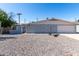 Charming single-story home with a well-maintained front yard and a convenient attached two-car garage at 3811 W Loma Ln, Phoenix, AZ 85051