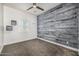 Bedroom with gray paneled wall, carpet, ceiling fan, and white window shutters at 3822 E Canyon Pl, Chandler, AZ 85249