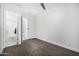 Bedroom with carpet, ceiling fan, and a view of a bathroom at 3822 E Canyon Pl, Chandler, AZ 85249