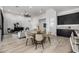 Bright, open-concept living room with modern furnishings and a dining area featuring stylish decor at 3822 E Canyon Pl, Chandler, AZ 85249