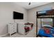 Cozy bedroom with a bunk bed, day bed, and gray walls at 4091 W Suncup Dr, San Tan Valley, AZ 85144