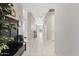 Hallway featuring a console table, coat rack and neutral paint at 4091 W Suncup Dr, San Tan Valley, AZ 85144