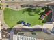 Green backyard with artificial turf and stone landscaping, providing a clean and modern look at 4111 S Dewdrop Ct, Gilbert, AZ 85297
