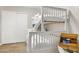 This bedroom features a white bunk bed, wood floors, closet and natural wood desk at 4111 S Dewdrop Ct, Gilbert, AZ 85297