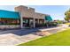 Charming community clubhouse with teal awnings and well-manicured landscaping at 4216 E Sandia St, Phoenix, AZ 85044