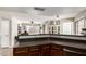 Well-appointed kitchen featuring a breakfast bar overlooking an open floor plan at 4216 E Sandia St, Phoenix, AZ 85044