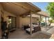 Comfortable patio with lounge area and pergola, creating a relaxing outdoor space at 4216 E Sandia St, Phoenix, AZ 85044