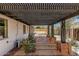 Inviting backyard patio with pergola, desert landscaping, pool and mountain views at 4416 E Capistrano Ave, Phoenix, AZ 85044