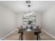 Tastefully decorated dining room with modern lighting and comfortable seating at 4416 E Capistrano Ave, Phoenix, AZ 85044