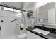 Modern bathroom features a walk-in shower, sleek fixtures, and ample counter space at 4680 E Nightingale Ln, Gilbert, AZ 85298