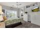 Primary bedroom with shuttered windows, an ensuite bathroom, and a comfortable bed at 4680 E Nightingale Ln, Gilbert, AZ 85298