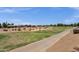 Beautiful golf course views with paved path and desert landscaping at 4680 E Nightingale Ln, Gilbert, AZ 85298