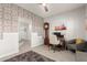 Comfortable home office featuring decorative wall accents and a classic grandfather clock at 5113 W Molly Ln, Phoenix, AZ 85083