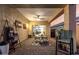 Covered patio with comfortable seating, ceiling fan, and view of landscaped backyard at 5113 W Molly Ln, Phoenix, AZ 85083