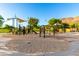 A colorful playground with slides, swings, and climbing structures offers endless fun in a safe and engaging environment at 5113 W Molly Ln, Phoenix, AZ 85083