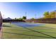 Enjoy the community tennis court with mountain views, perfect for recreational play and exercise at 5113 W Molly Ln, Phoenix, AZ 85083