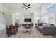 Staged living room with modern furniture and decor, showcasing a comfortable and inviting space at 5420 W Grove St, Laveen, AZ 85339