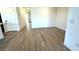 A spacious living room with wood flooring and a bright, open feel at 5657 S 253Rd Ave, Buckeye, AZ 85326
