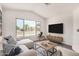 Virtual staging showing a bright bedroom with a vaulted ceiling and large window at 6502 W Wahalla Ln, Glendale, AZ 85308