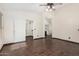 Spacious bedroom with beautiful tile floors and access to a walk-in closet and en-suite bathroom at 6502 W Wahalla Ln, Glendale, AZ 85308