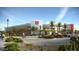 Exterior of modern hospital with well-manicured landscaping and ample parking at 6502 W Wahalla Ln, Glendale, AZ 85308