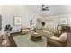 Virtual staging showing a cozy living room with natural light and an airy feel at 6502 W Wahalla Ln, Glendale, AZ 85308