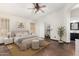 Serene main bedroom with elegant decor, a comfortable bed, and a stylish ensuite bathroom at 6502 W Wahalla Ln, Glendale, AZ 85308
