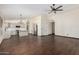 Spacious open floorplan with seamless flow between the kitchen, dining, and living areas at 6502 W Wahalla Ln, Glendale, AZ 85308