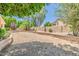 Low maintenance backyard featuring mature trees offering shade and a desert landscape at 728 W Sandra Ter, Phoenix, AZ 85023
